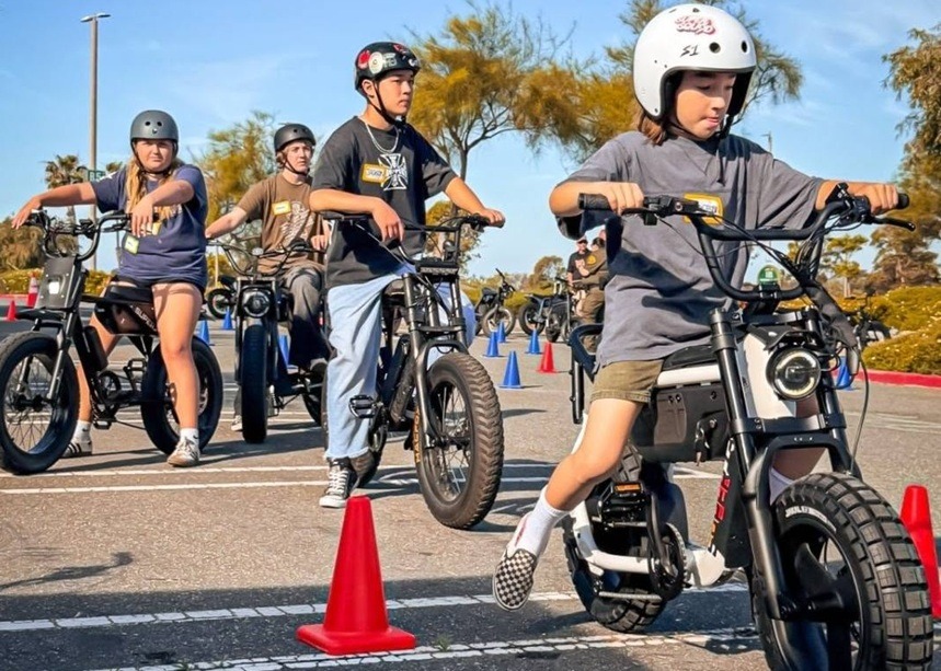 Law enforcement instructor working directly with eBike riders